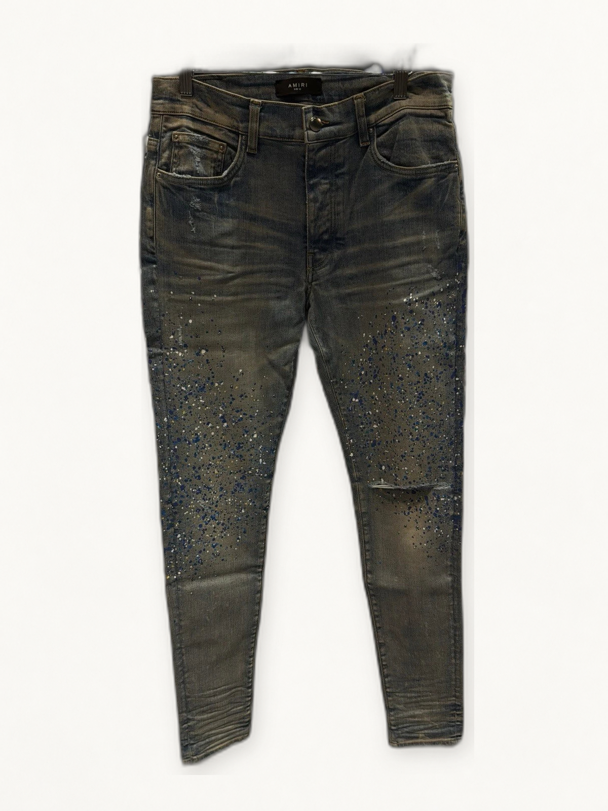 Amiri blue crystal painter jeans on warm off white studio background