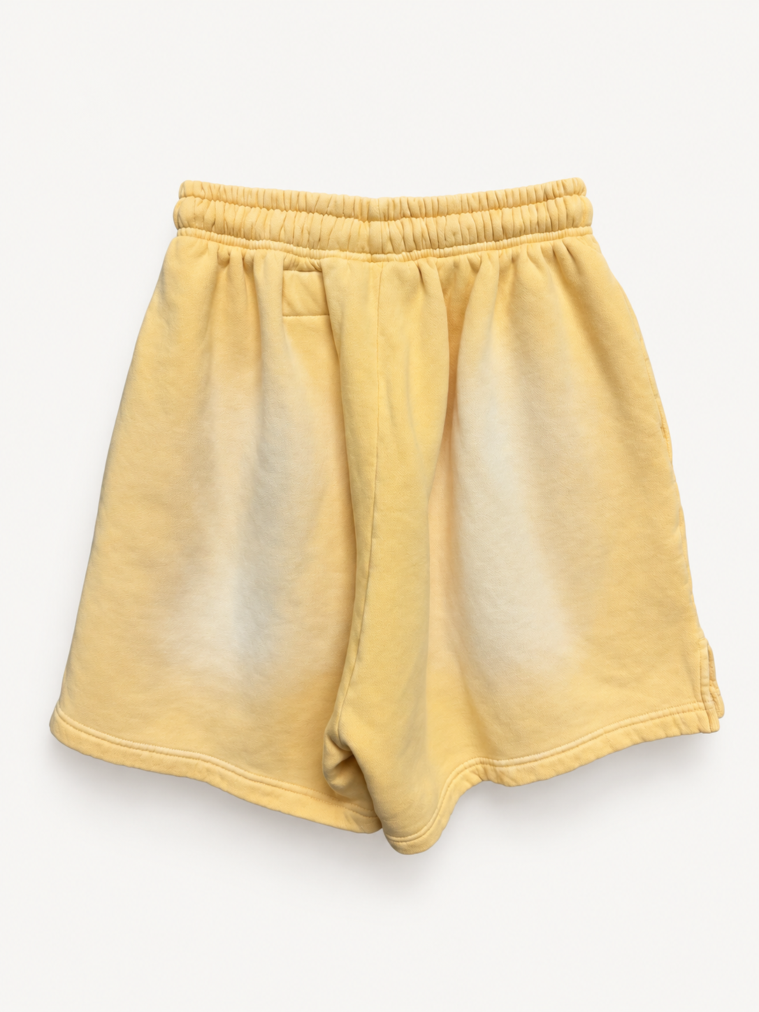 Hellstar Yellow Flame Warm Up Shorts back studio view.