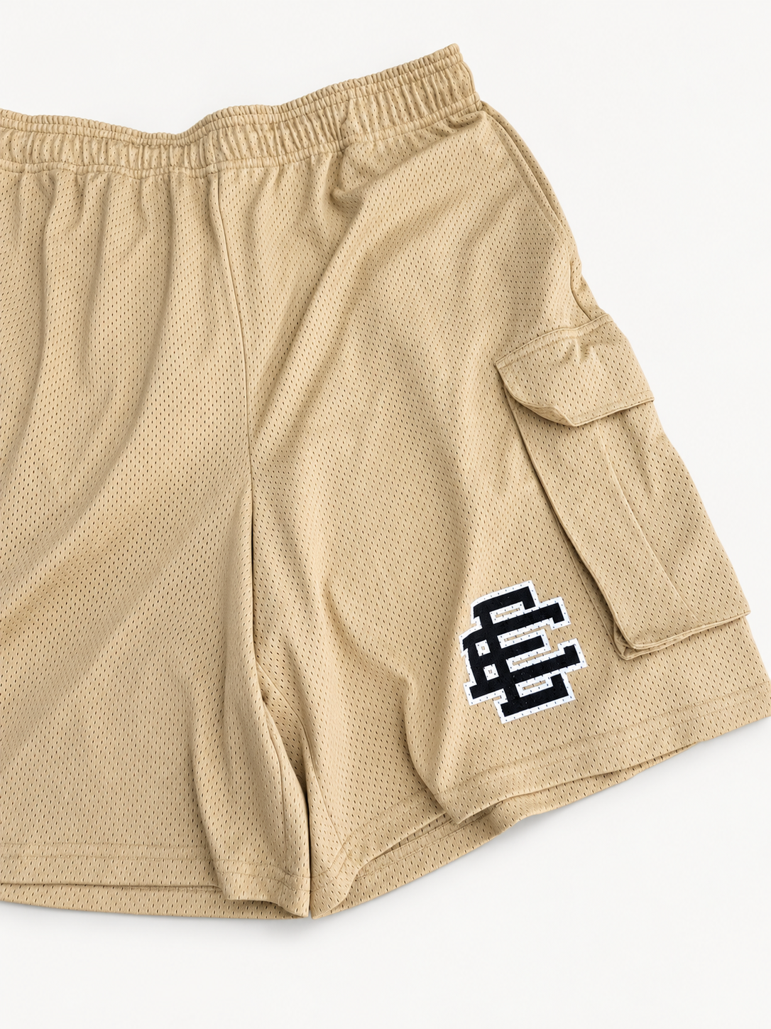 Eric Emanuel Beige Mesh Cargo Shorts logo and pocket detail studio view
