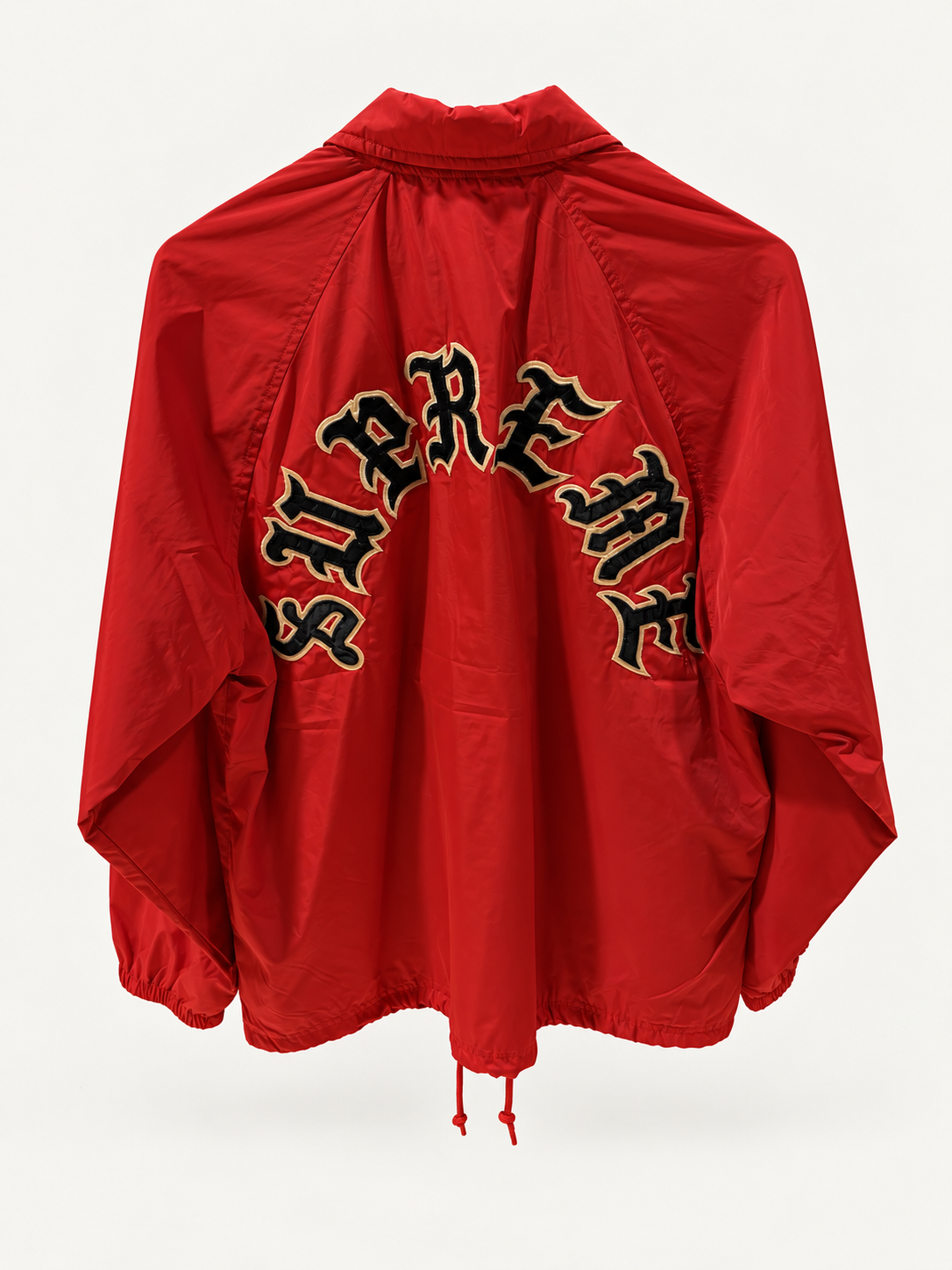 Supreme Red Old English Arc Coaches Jacket back studio view.