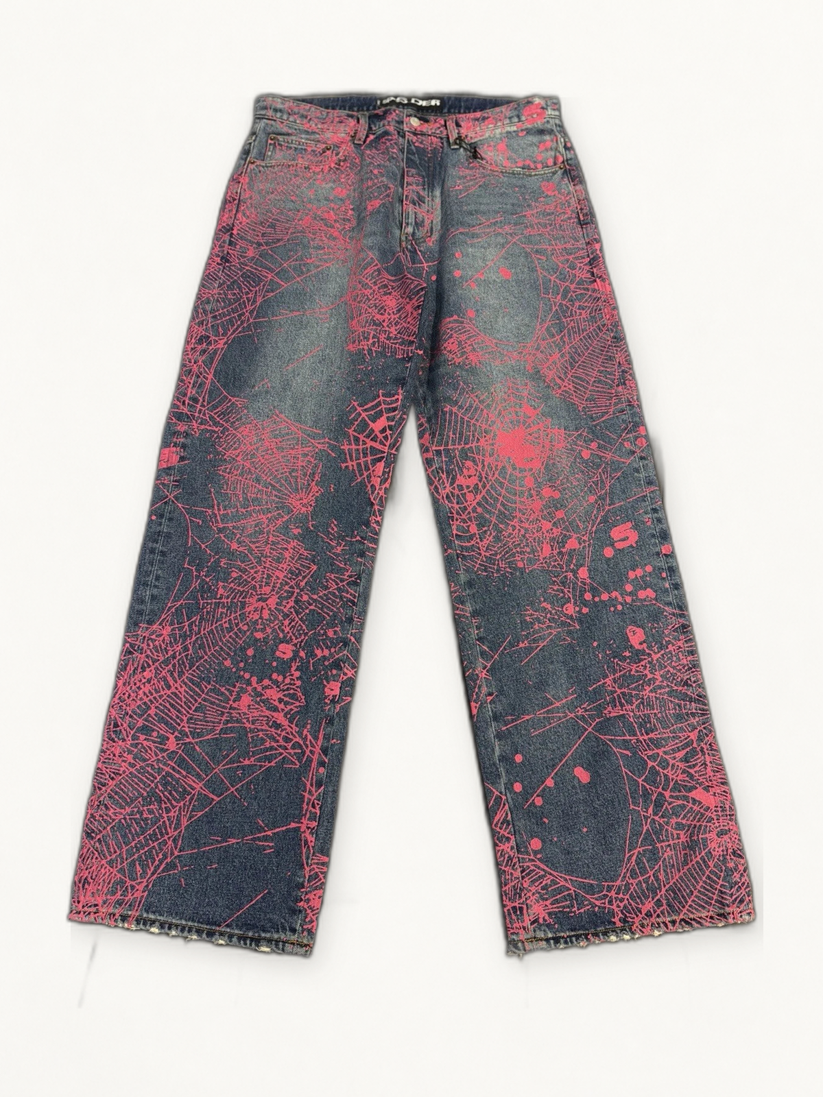 Sp5der blue pink web denim on warm off white studio background