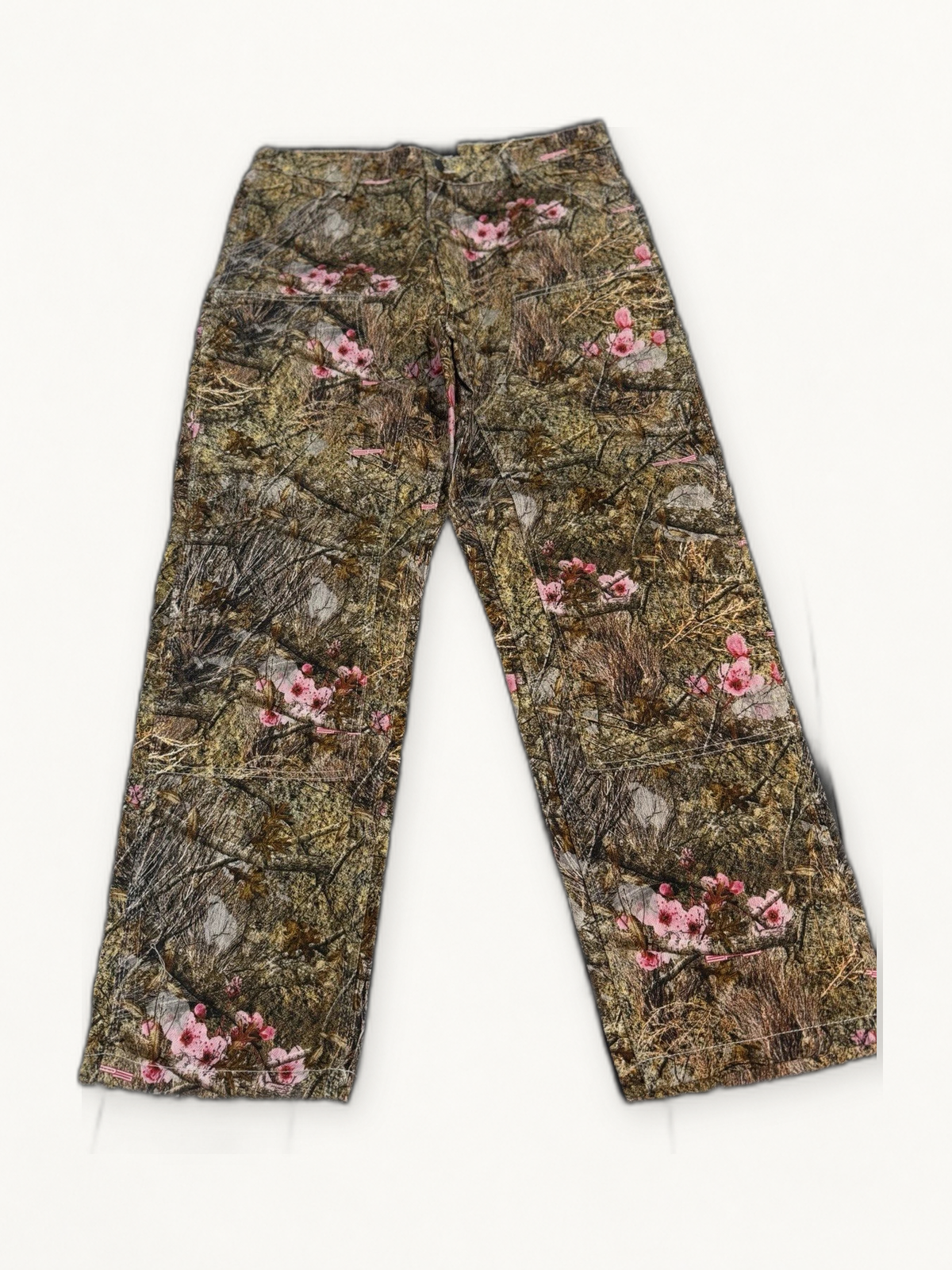 Sp5der pink camo denim on warm off white studio background